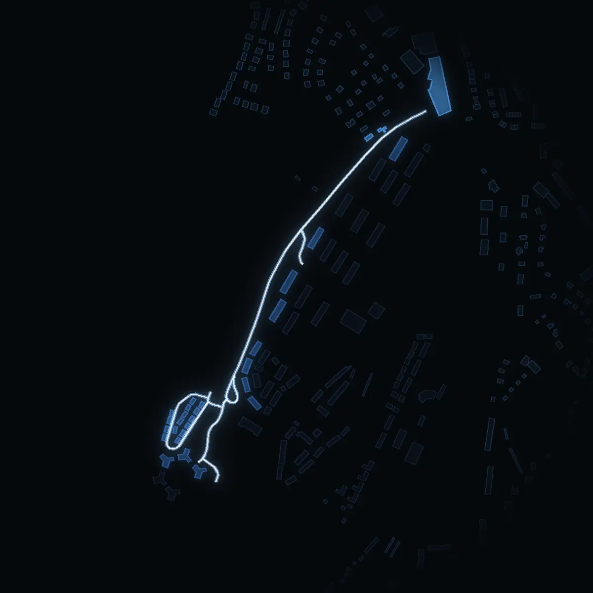 The street at night: Backluravägen drawn in white, its buildings lit in the colour of their area’s income