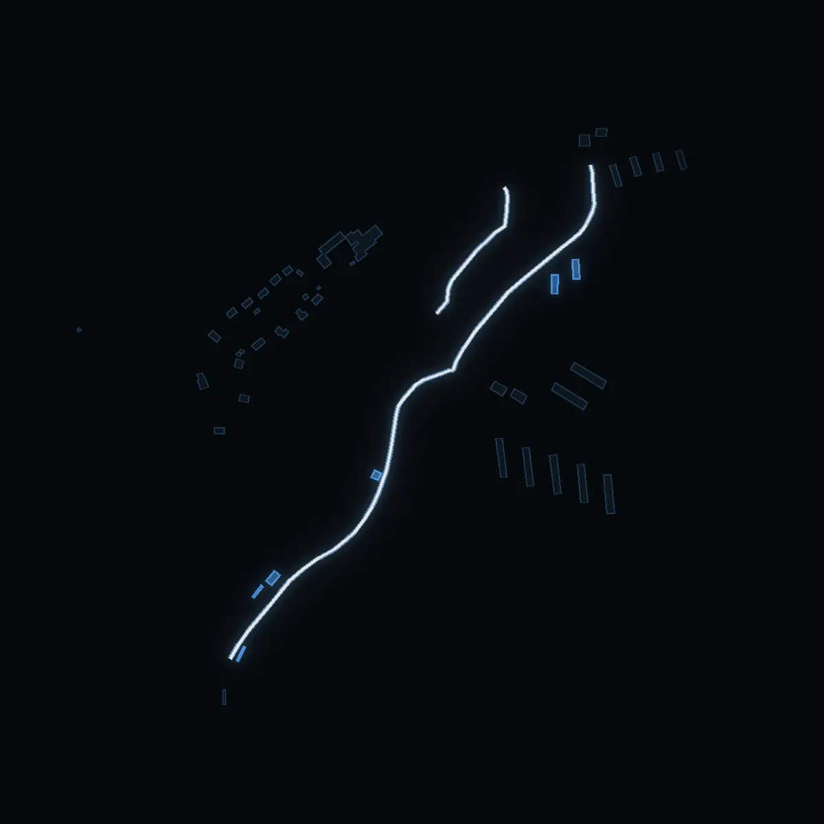 The street at night: Hillersjövägen drawn in white, its buildings lit in the colour of their area’s income