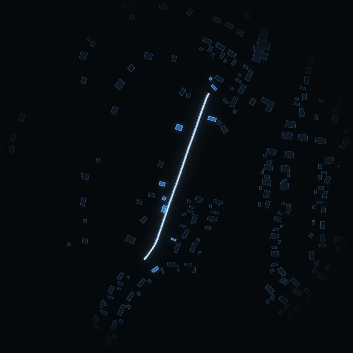 The street at night: Kärrvägen drawn in white, its buildings lit in the colour of their area’s income