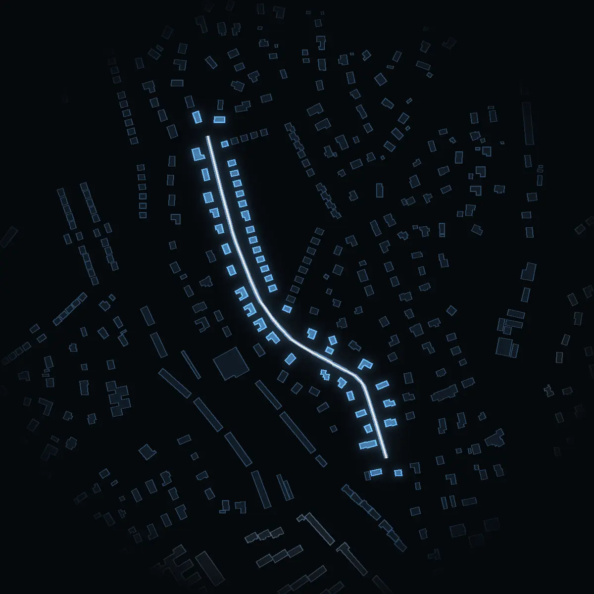 The street at night: Ansgariusvägen drawn in white, its buildings lit in the colour of their area’s income