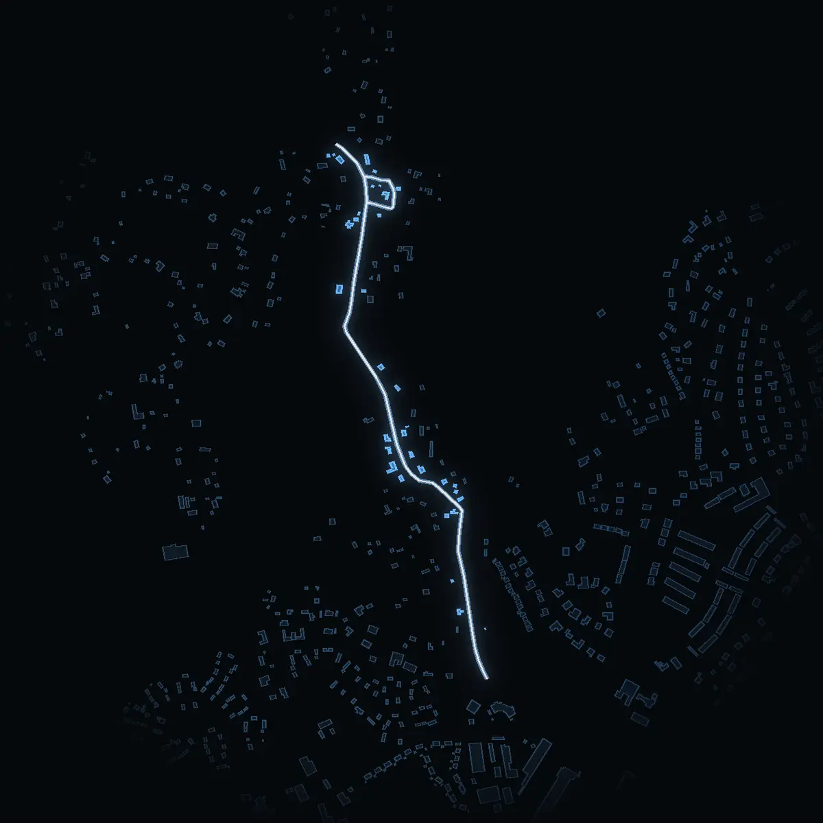 The street at night: Garnsviksvägen drawn in white, its buildings lit in the colour of their area’s income