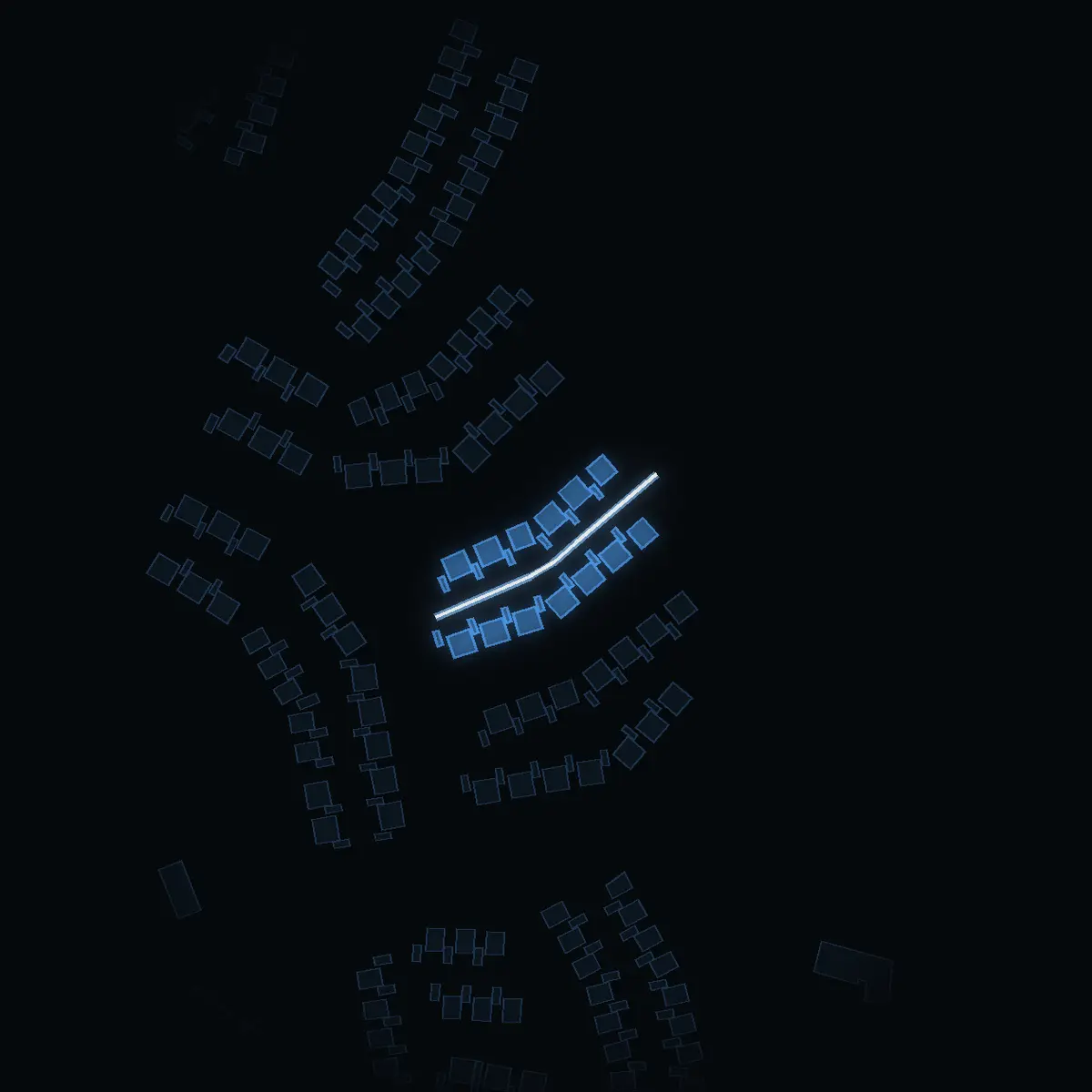 The street at night: Kattfotstigen drawn in white, its buildings lit in the colour of their area’s income