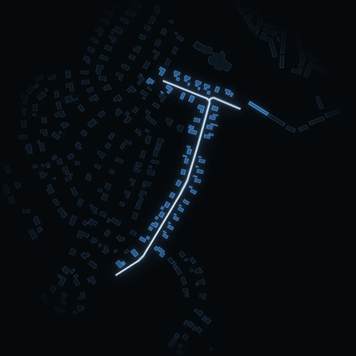 The street at night: Germunds väg drawn in white, its buildings lit in the colour of their area’s income