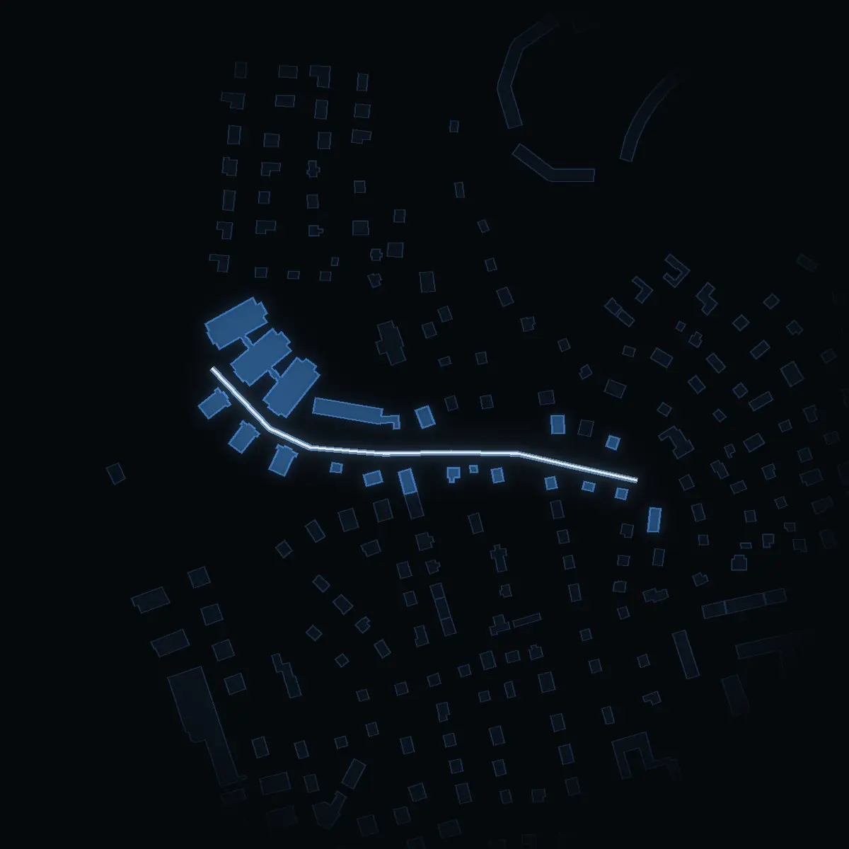 The street at night: Bruksgatan drawn in white, its buildings lit in the colour of their area’s income