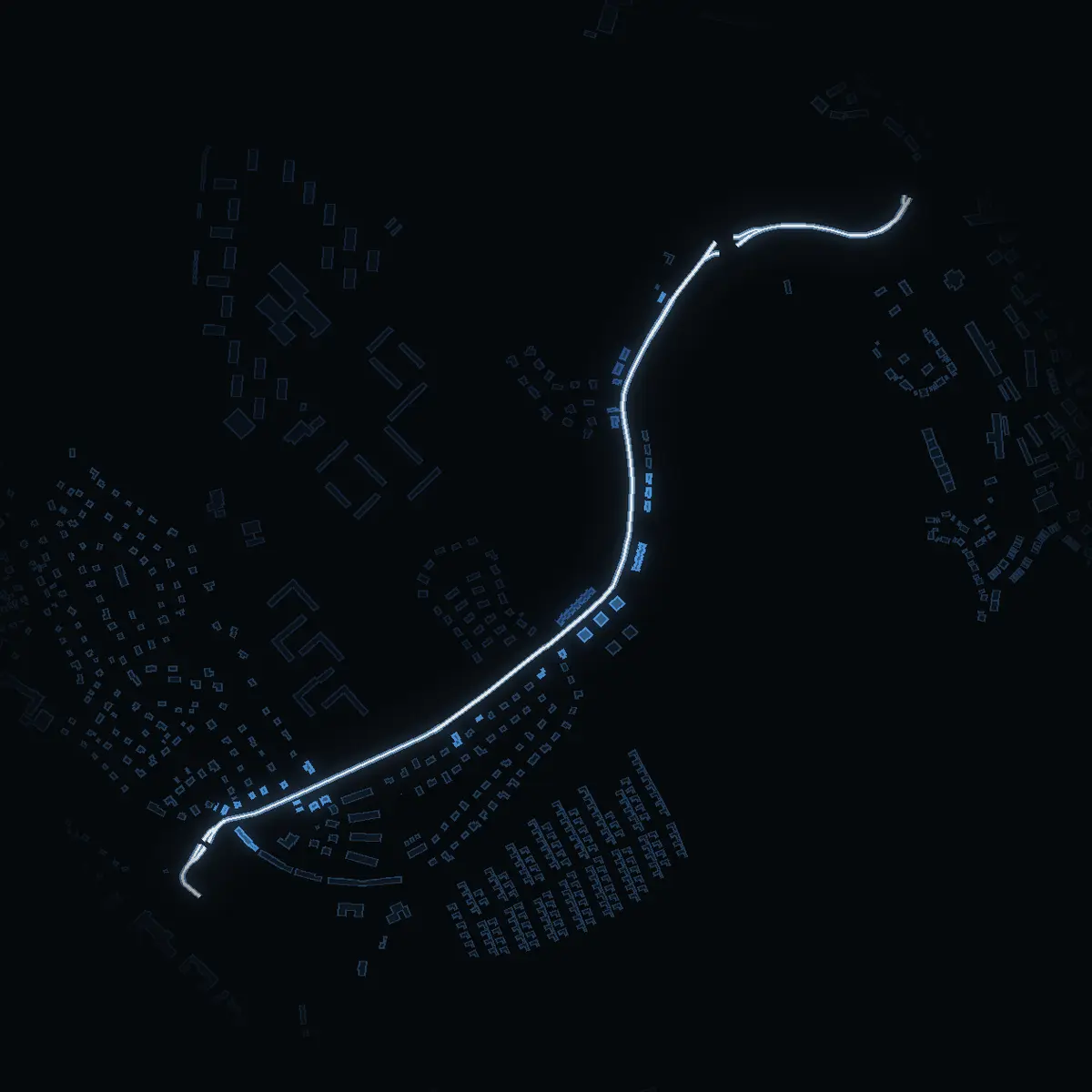 The street at night: Glasbergavägen drawn in white, its buildings lit in the colour of their area’s income