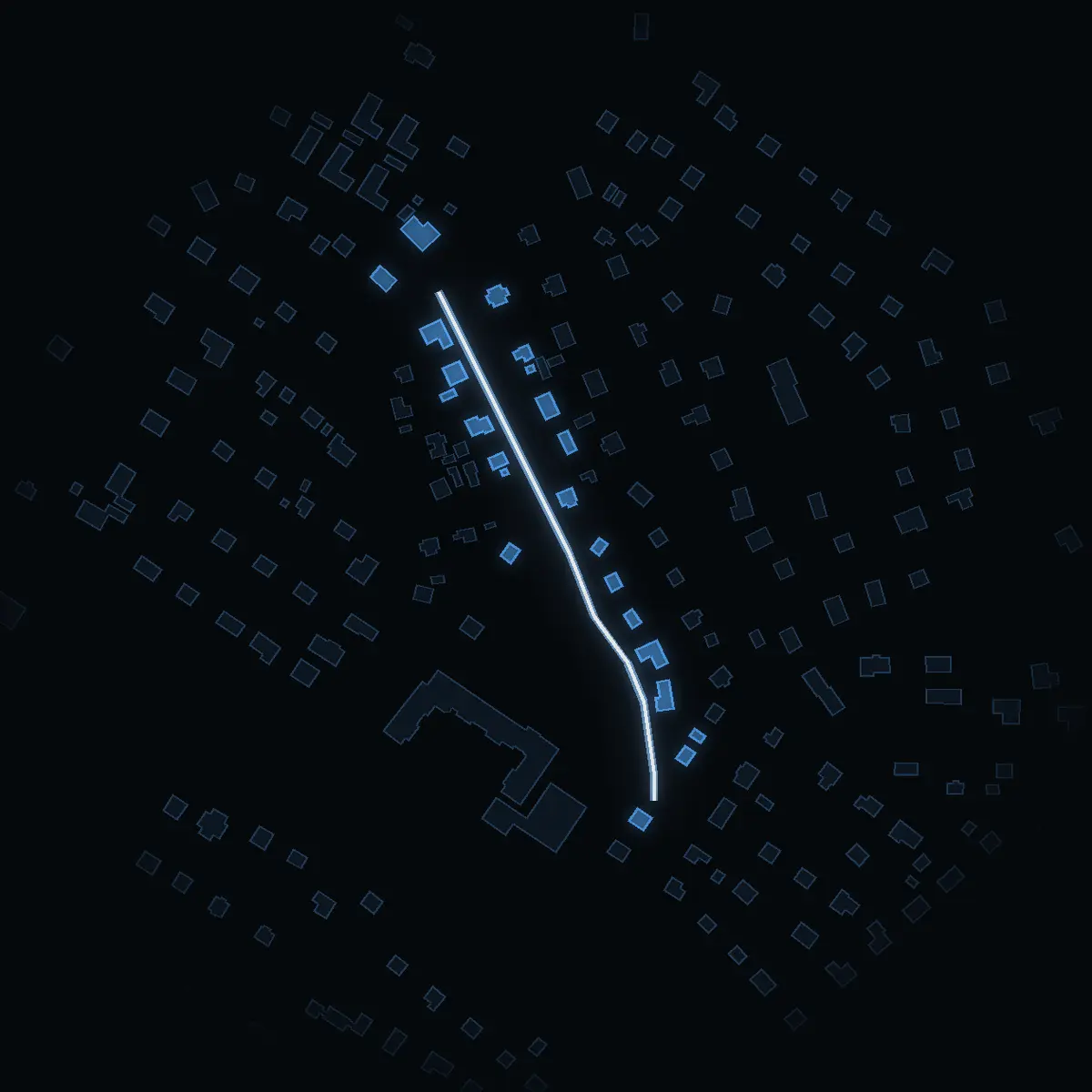 The street at night: Jarlavägen drawn in white, its buildings lit in the colour of their area’s income