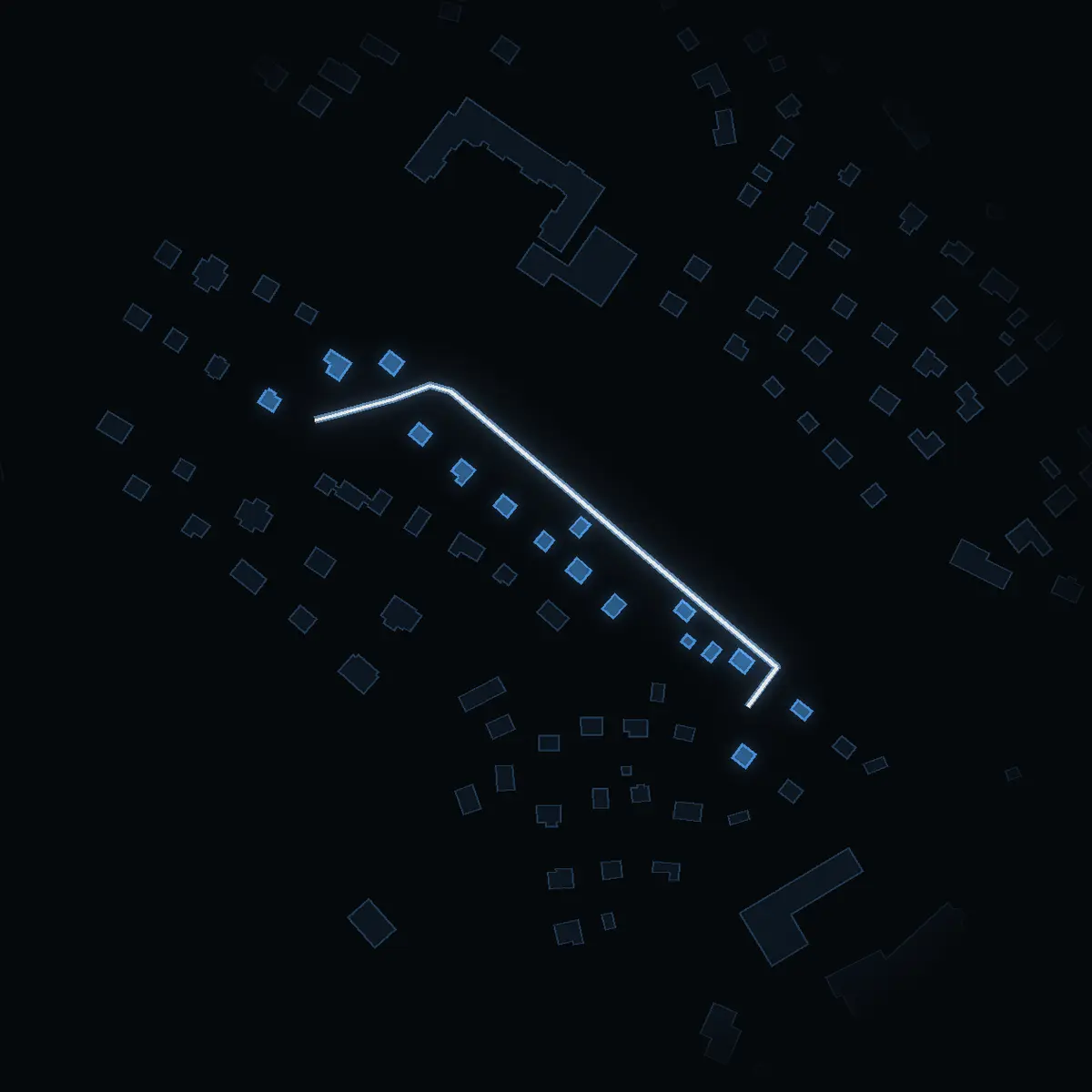 The street at night: Järnvägspromenaden drawn in white, its buildings lit in the colour of their area’s income