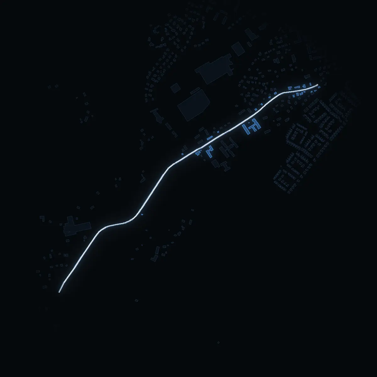 The street at night: Mölnbovägen drawn in white, its buildings lit in the colour of their area’s income