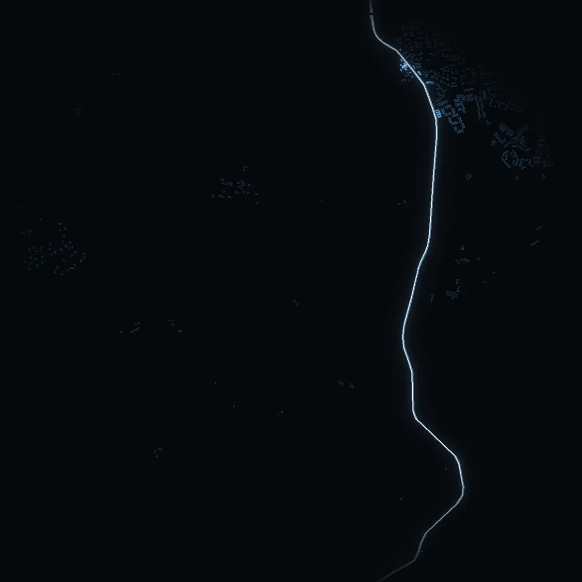 The street at night: Nyköpingsvägen drawn in white, its buildings lit in the colour of their area’s income
