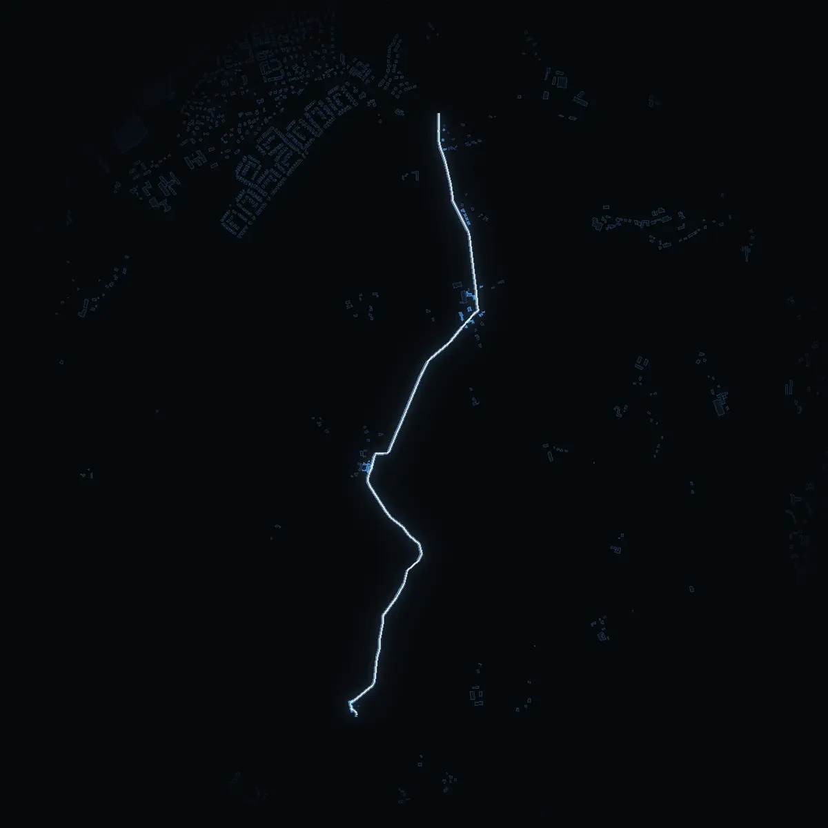 The street at night: Skävevägen drawn in white, its buildings lit in the colour of their area’s income