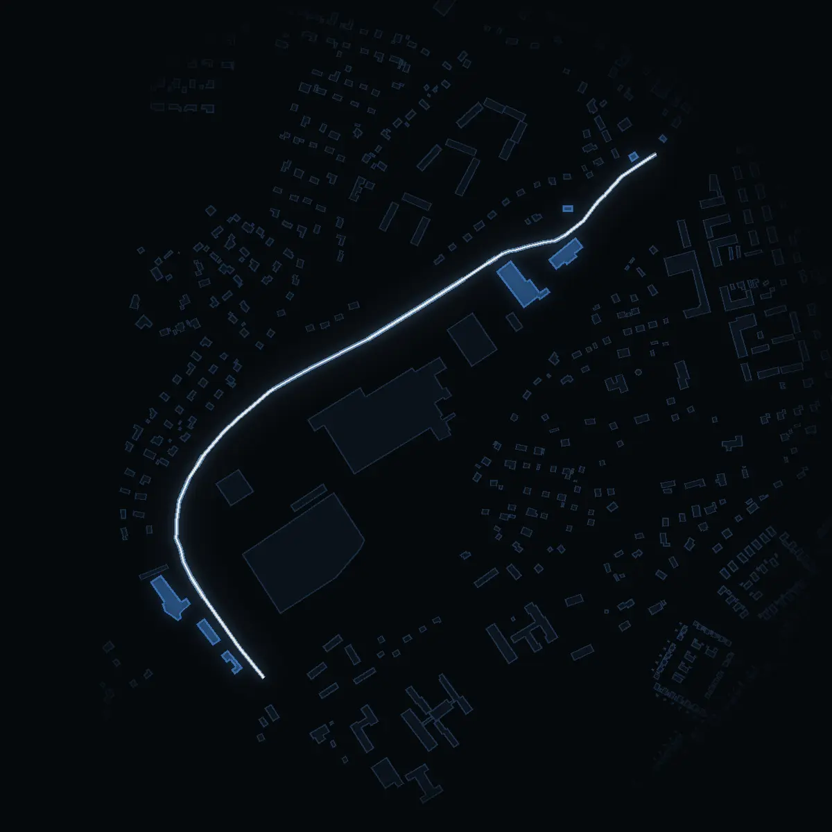 The street at night: Snickarvägen drawn in white, its buildings lit in the colour of their area’s income