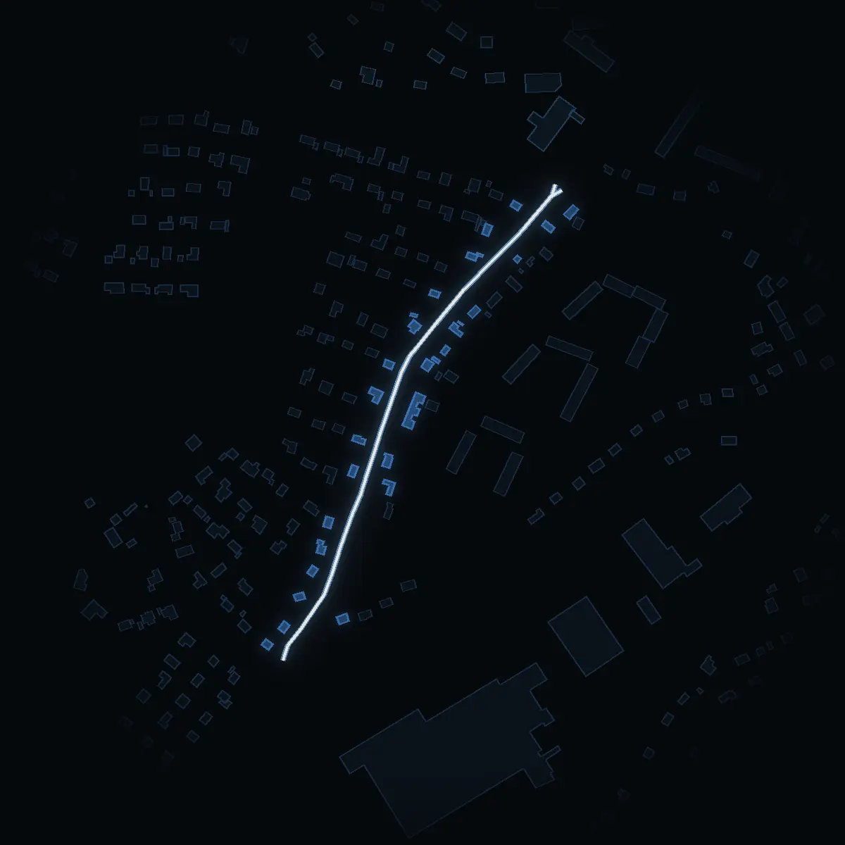 The street at night: Tällebyvägen drawn in white, its buildings lit in the colour of their area’s income