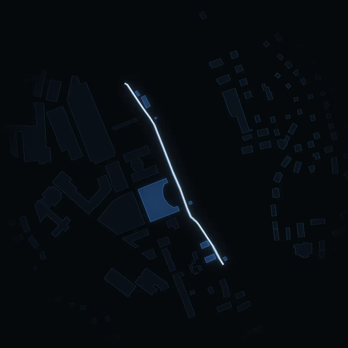 The street at night: Västra Mälarhamnen drawn in white, its buildings lit in the colour of their area’s income