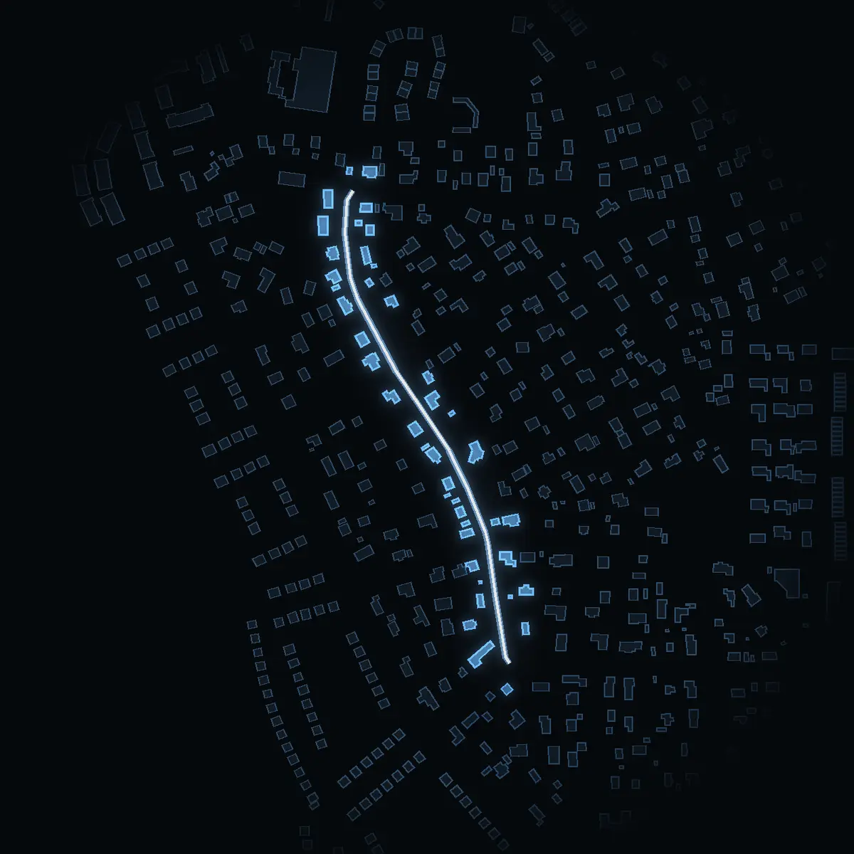 The street at night: Dalavägen drawn in white, its buildings lit in the colour of their area’s income