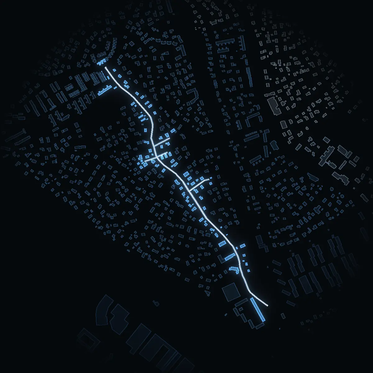 The street at night: Eriksbergsvägen drawn in white, its buildings lit in the colour of their area’s income