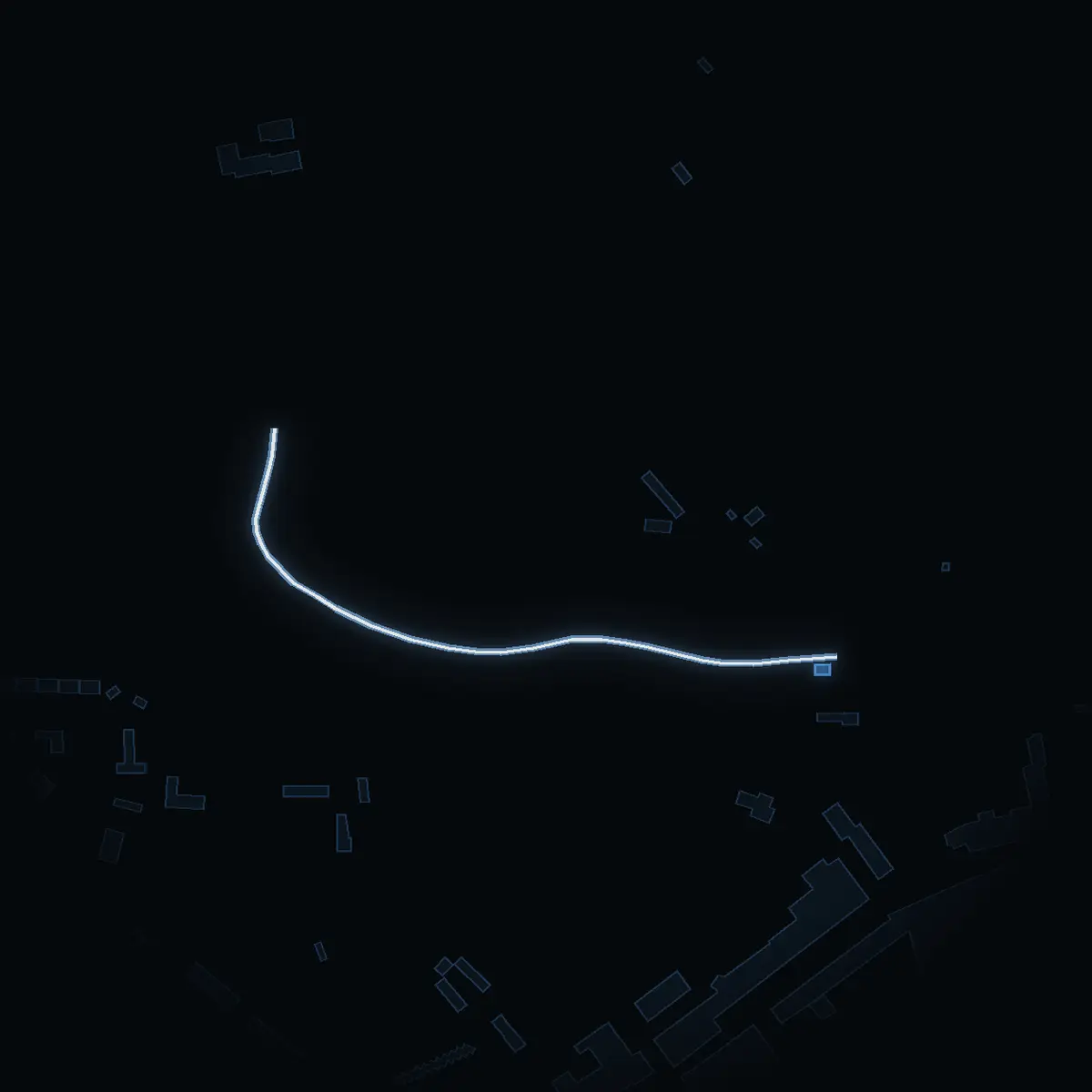 The street at night: Klockarebacksvägen drawn in white, its buildings lit in the colour of their area’s income
