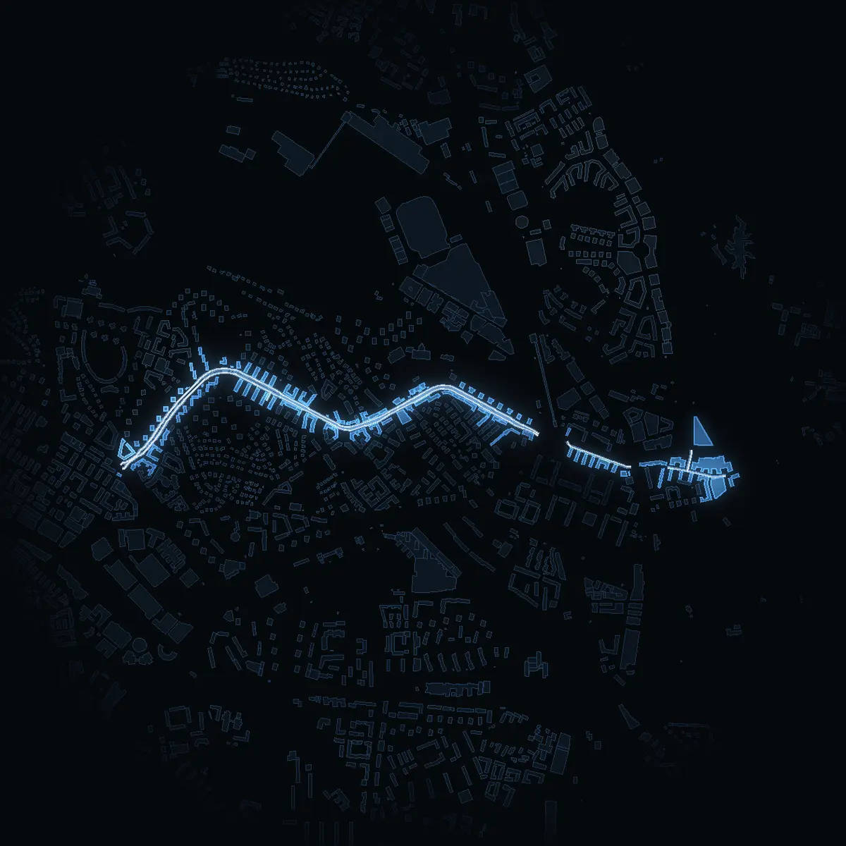 The street at night: Råsundavägen drawn in white, its buildings lit in the colour of their area’s income