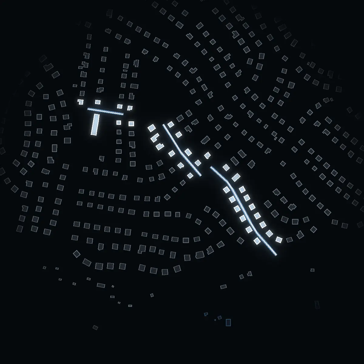 The street at night: Gustaf Lundbergs Väg drawn in white, its buildings lit in the colour of their area’s income