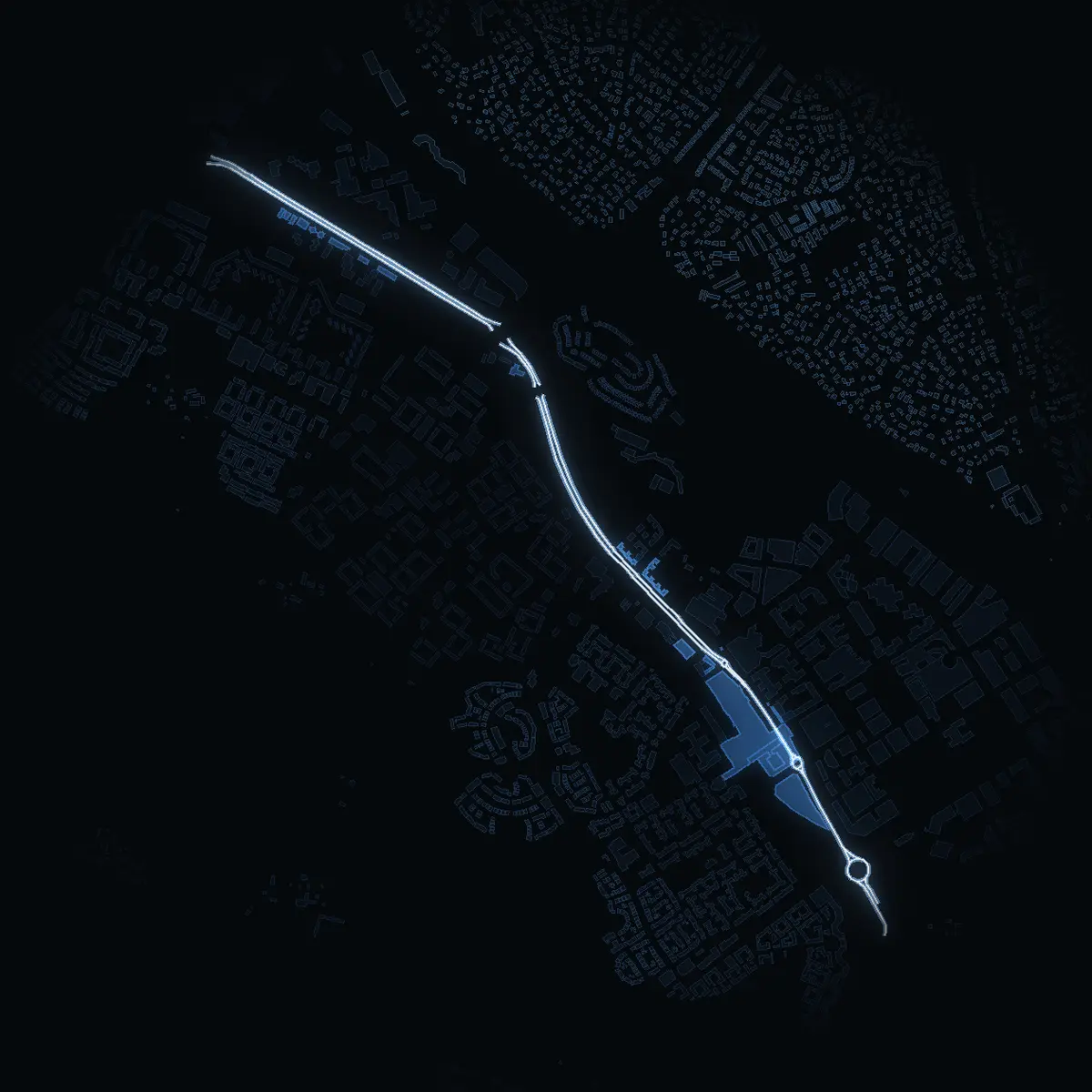 The street at night: Hanstavägen drawn in white, its buildings lit in the colour of their area’s income