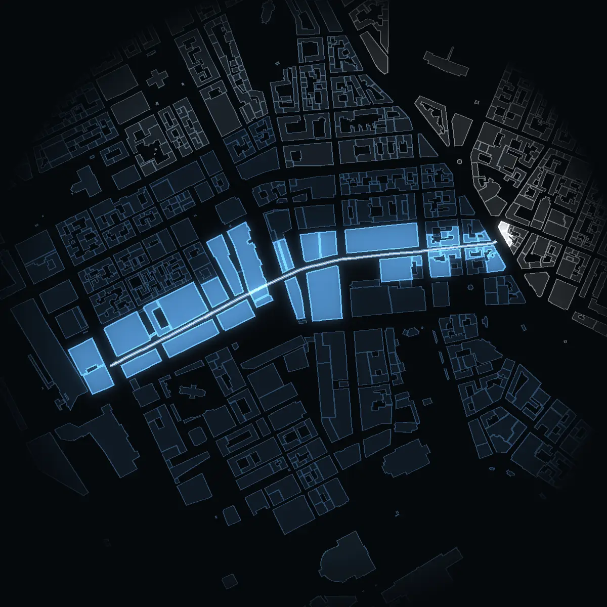The street at night: Mäster Samuelsgatan drawn in white, its buildings lit in the colour of their area’s income