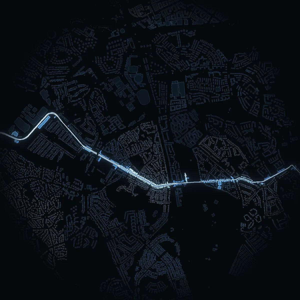 The street at night: Sockenvägen drawn in white, its buildings lit in the colour of their area’s income