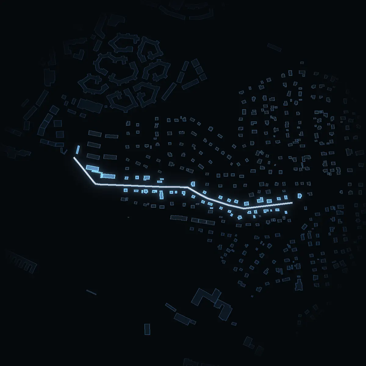 The street at night: Duvkullavägen drawn in white, its buildings lit in the colour of their area’s income