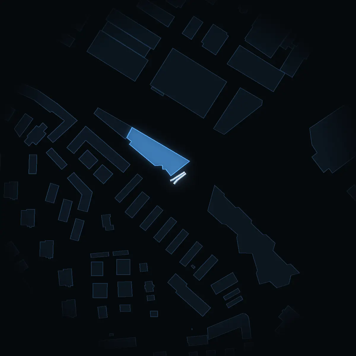 The street at night: Ekensbergsvägen drawn in white, its buildings lit in the colour of their area’s income