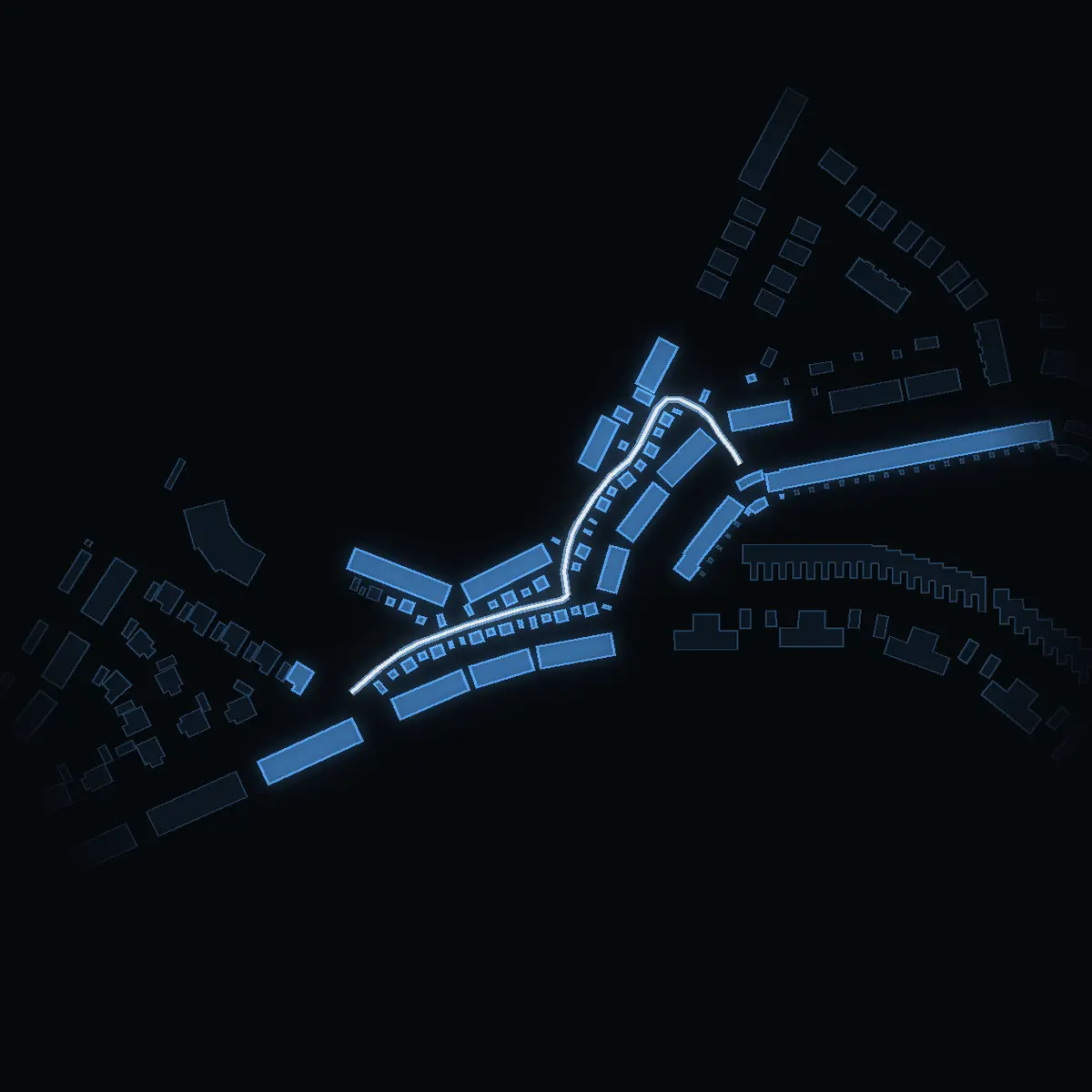 The street at night: Storlomsvägen drawn in white, its buildings lit in the colour of their area’s income