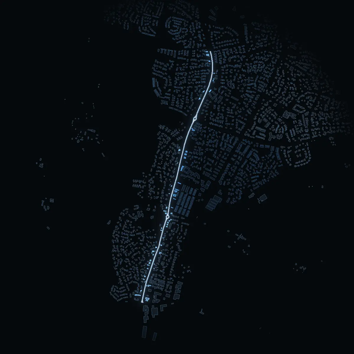 The street at night: Vikingavägen drawn in white, its buildings lit in the colour of their area’s income