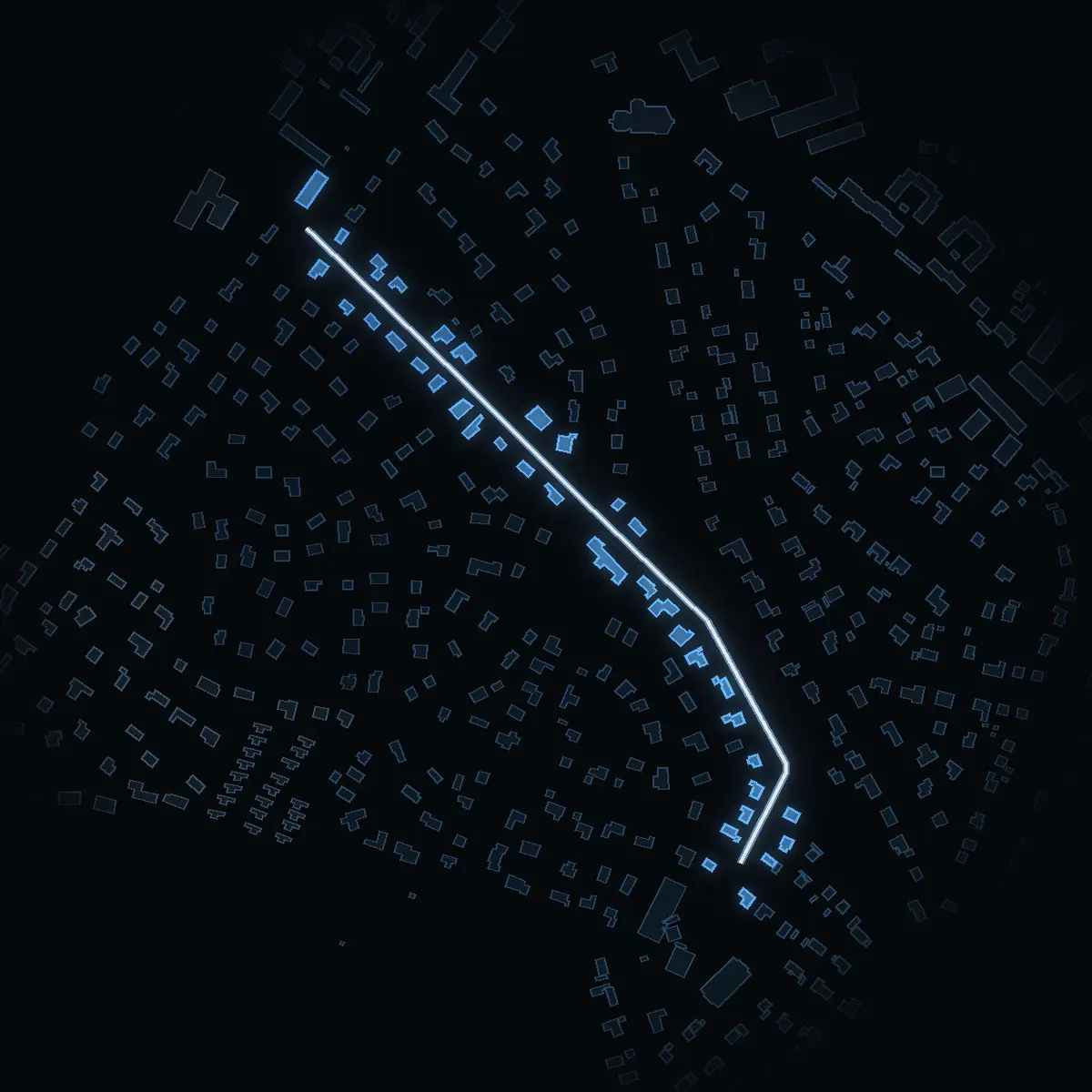The street at night: Ängsvägen drawn in white, its buildings lit in the colour of their area’s income