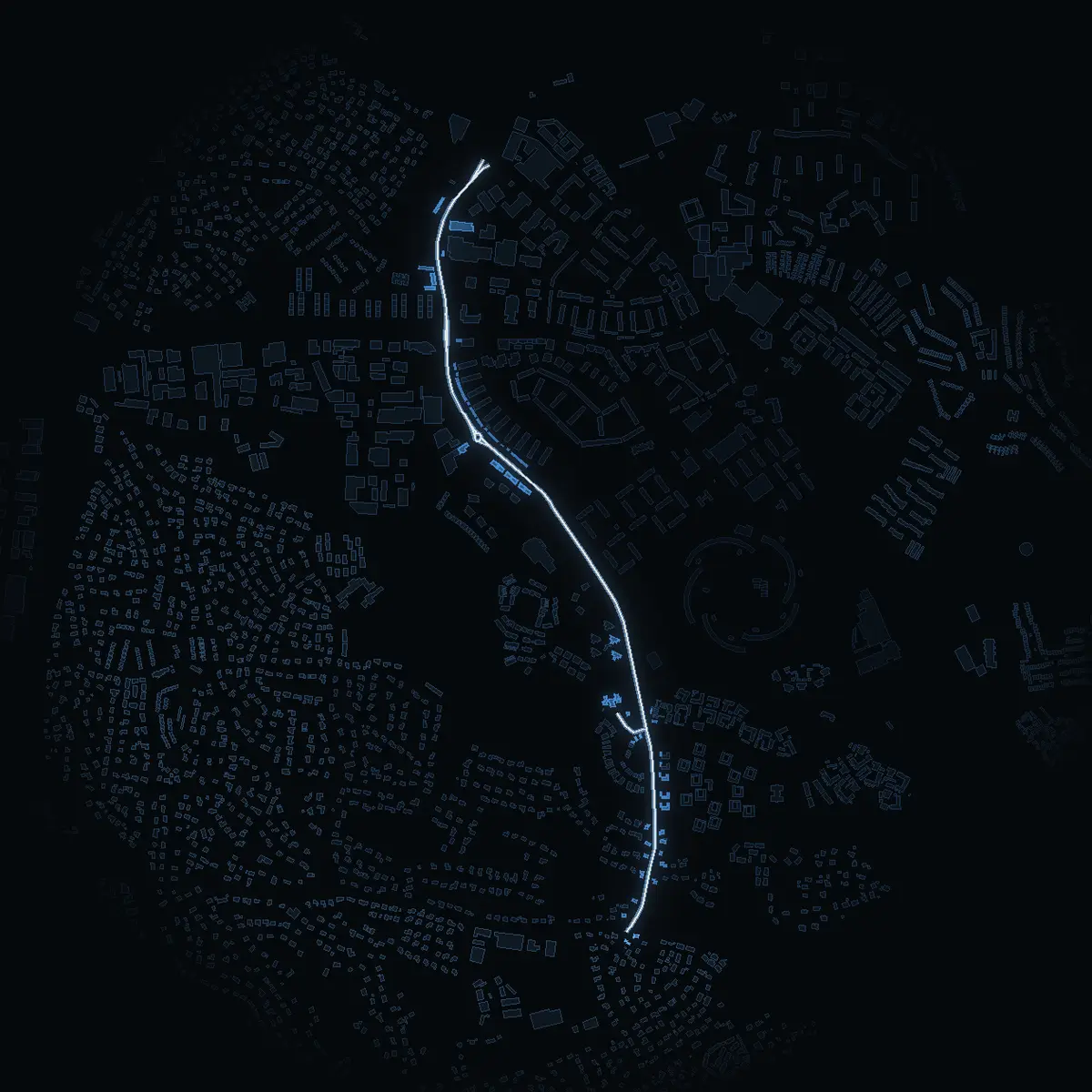 The street at night: Njupkärrsvägen drawn in white, its buildings lit in the colour of their area’s income