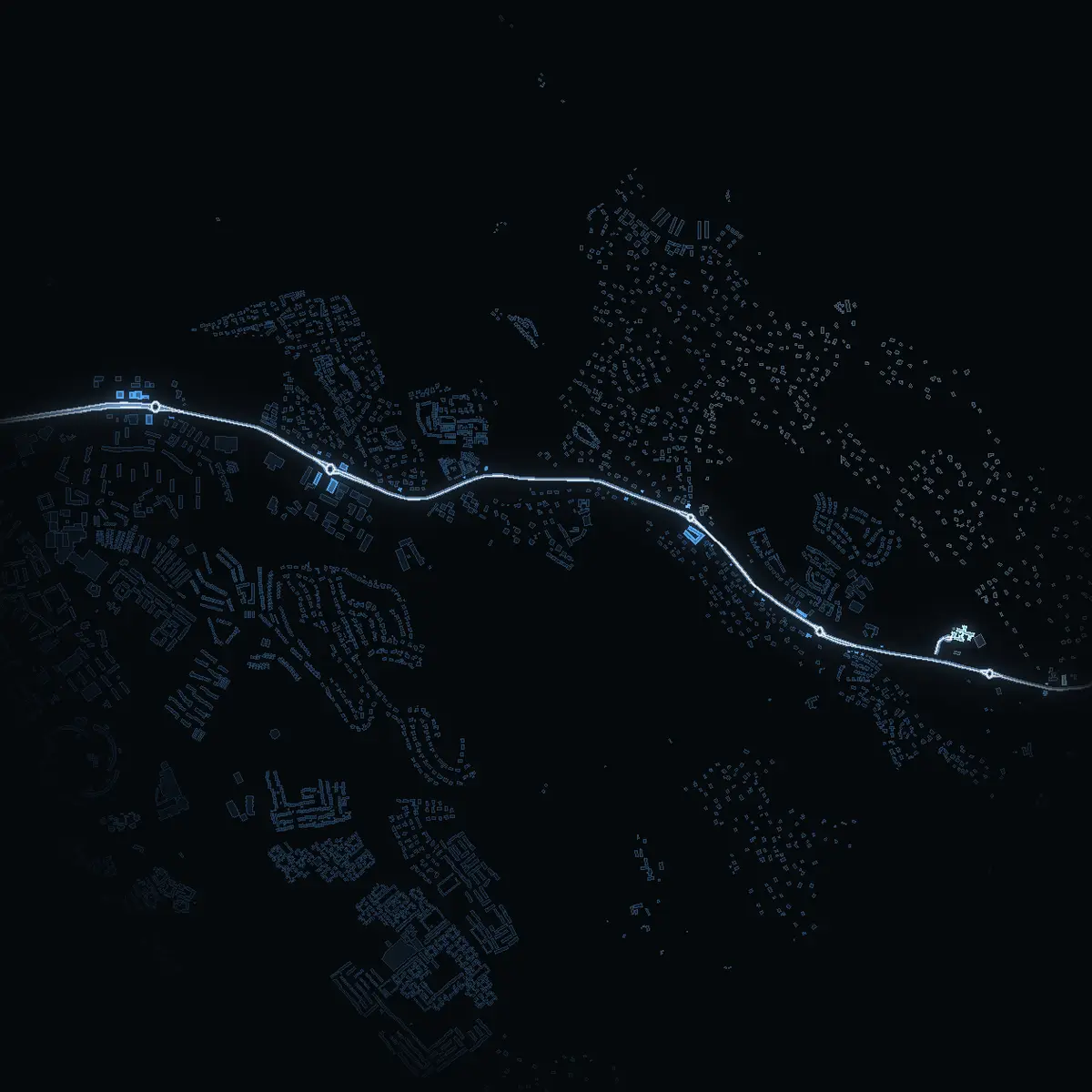 The street at night: Tyresövägen drawn in white, its buildings lit in the colour of their area’s income