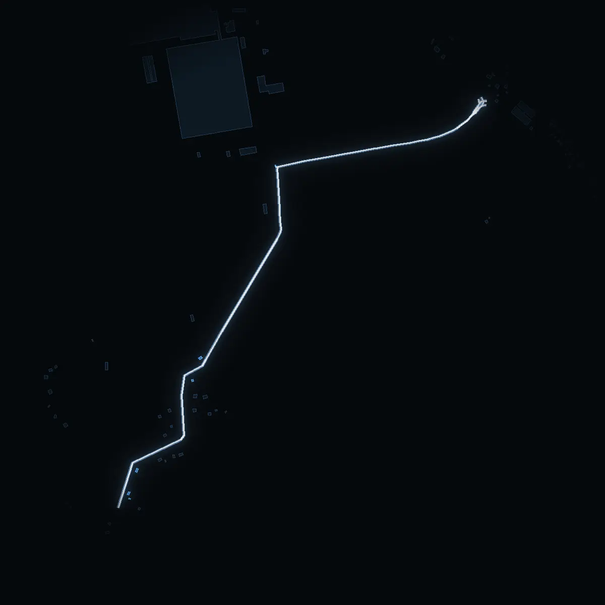 The street at night: Ängsuddsvägen drawn in white, its buildings lit in the colour of their area’s income