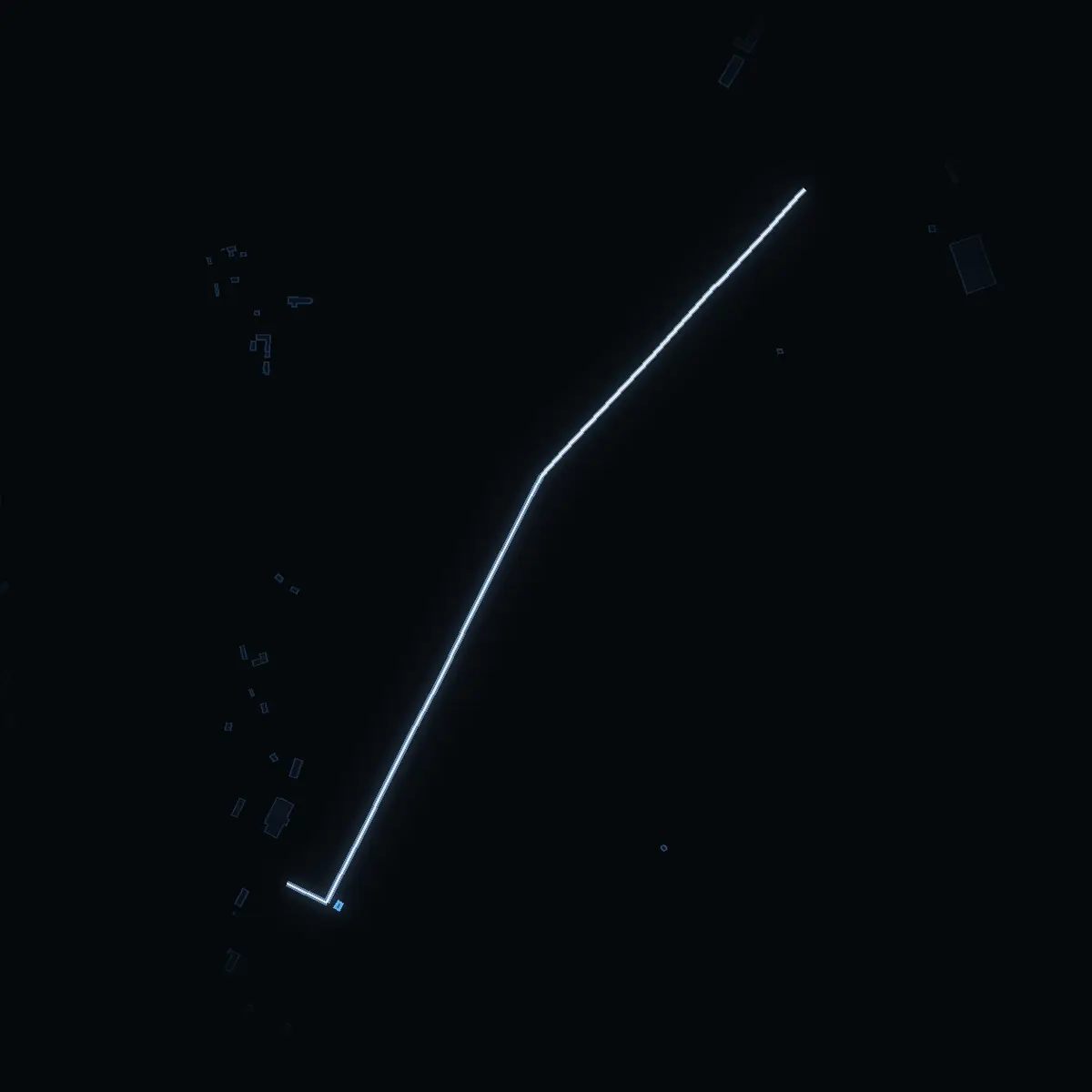 The street at night: Brogårdsallén drawn in white, its buildings lit in the colour of their area’s income
