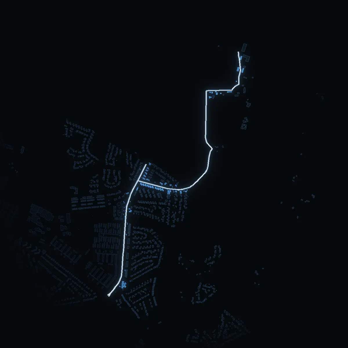 The street at night: Lejondalsvägen drawn in white, its buildings lit in the colour of their area’s income