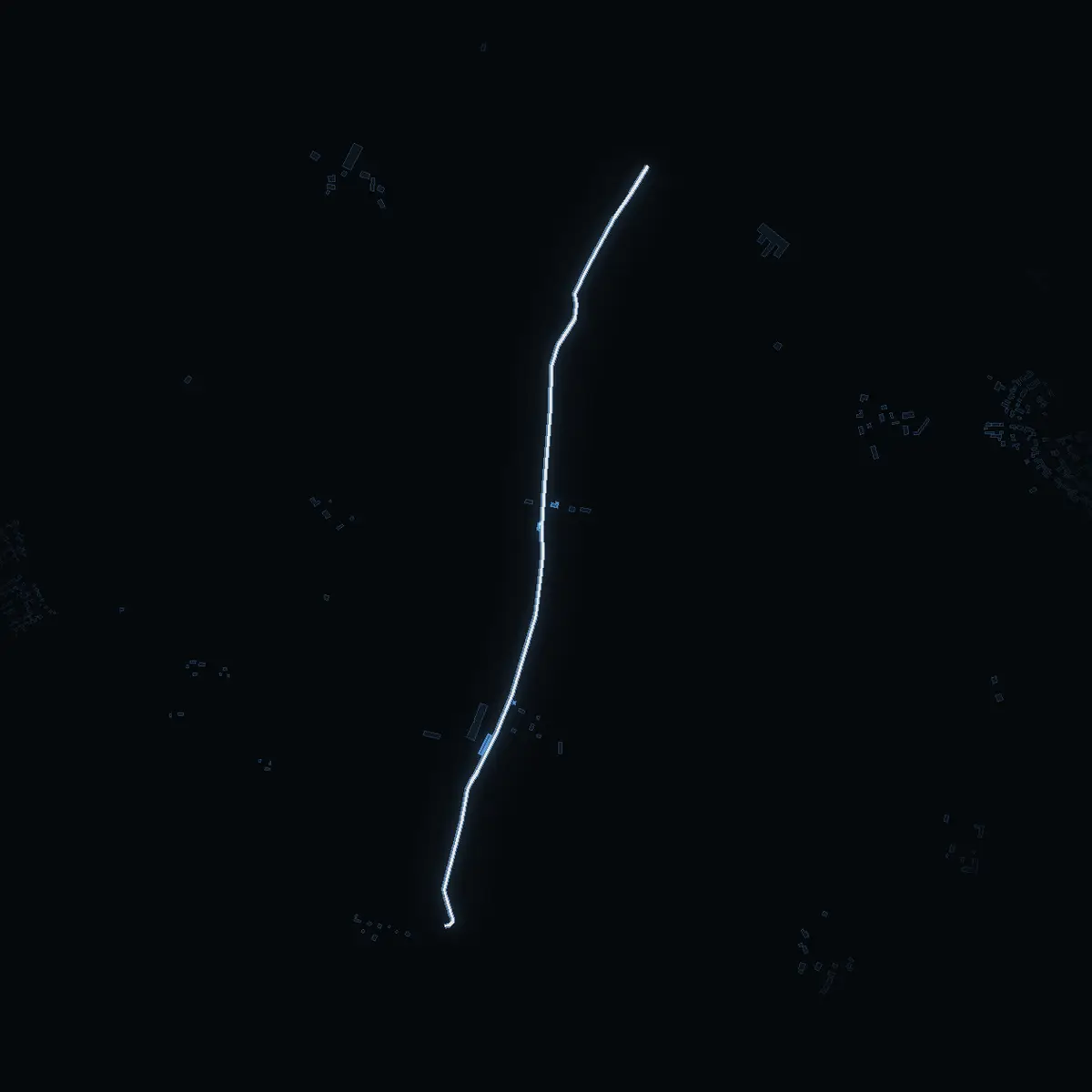 The street at night: Skråmstavägen drawn in white, its buildings lit in the colour of their area’s income