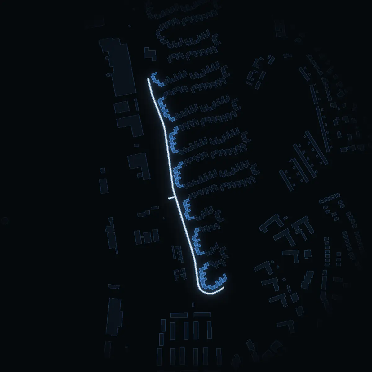 The street at night: Lohäradsvägen drawn in white, its buildings lit in the colour of their area’s income