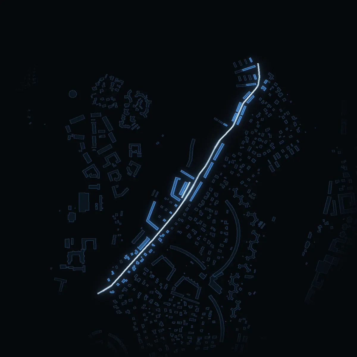 The street at night: Oxundavägen drawn in white, its buildings lit in the colour of their area’s income