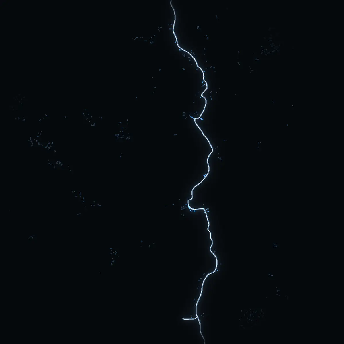The street at night: Sjöbergsvägen drawn in white, its buildings lit in the colour of their area’s income