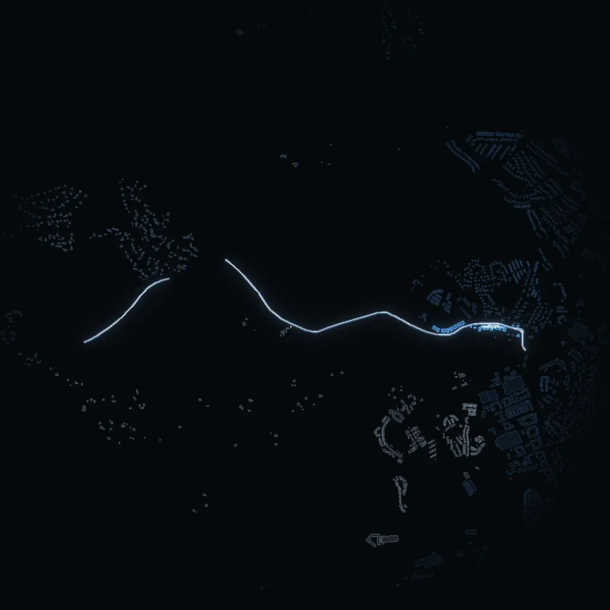 The street at night: Gamla Skärgårdsvägen drawn in white, its buildings lit in the colour of their area’s income