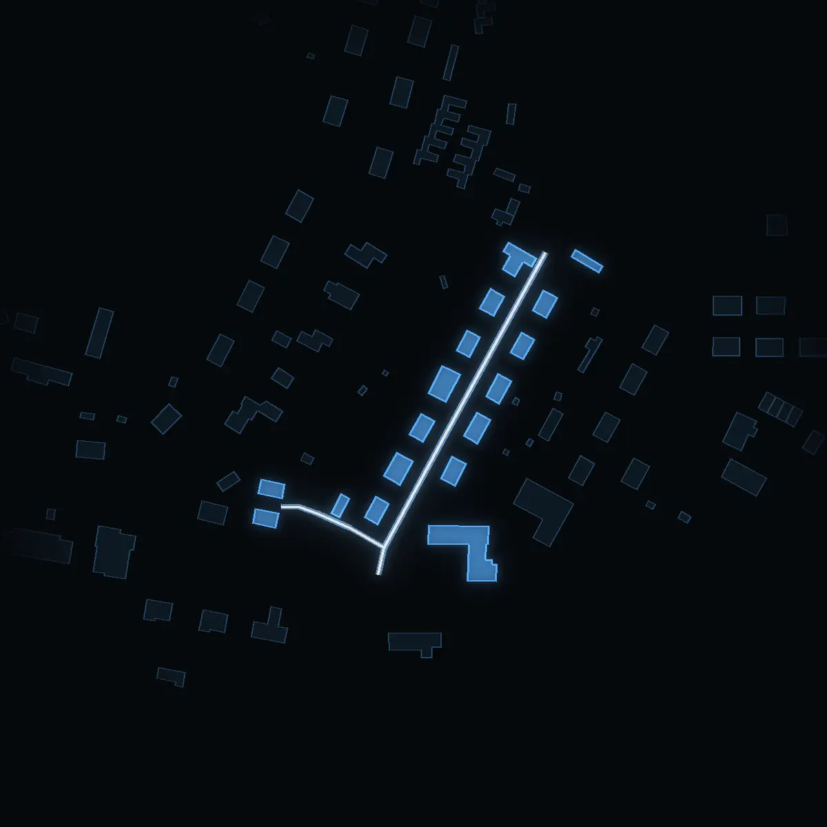 The street at night: Grindstugatan drawn in white, its buildings lit in the colour of their area’s income