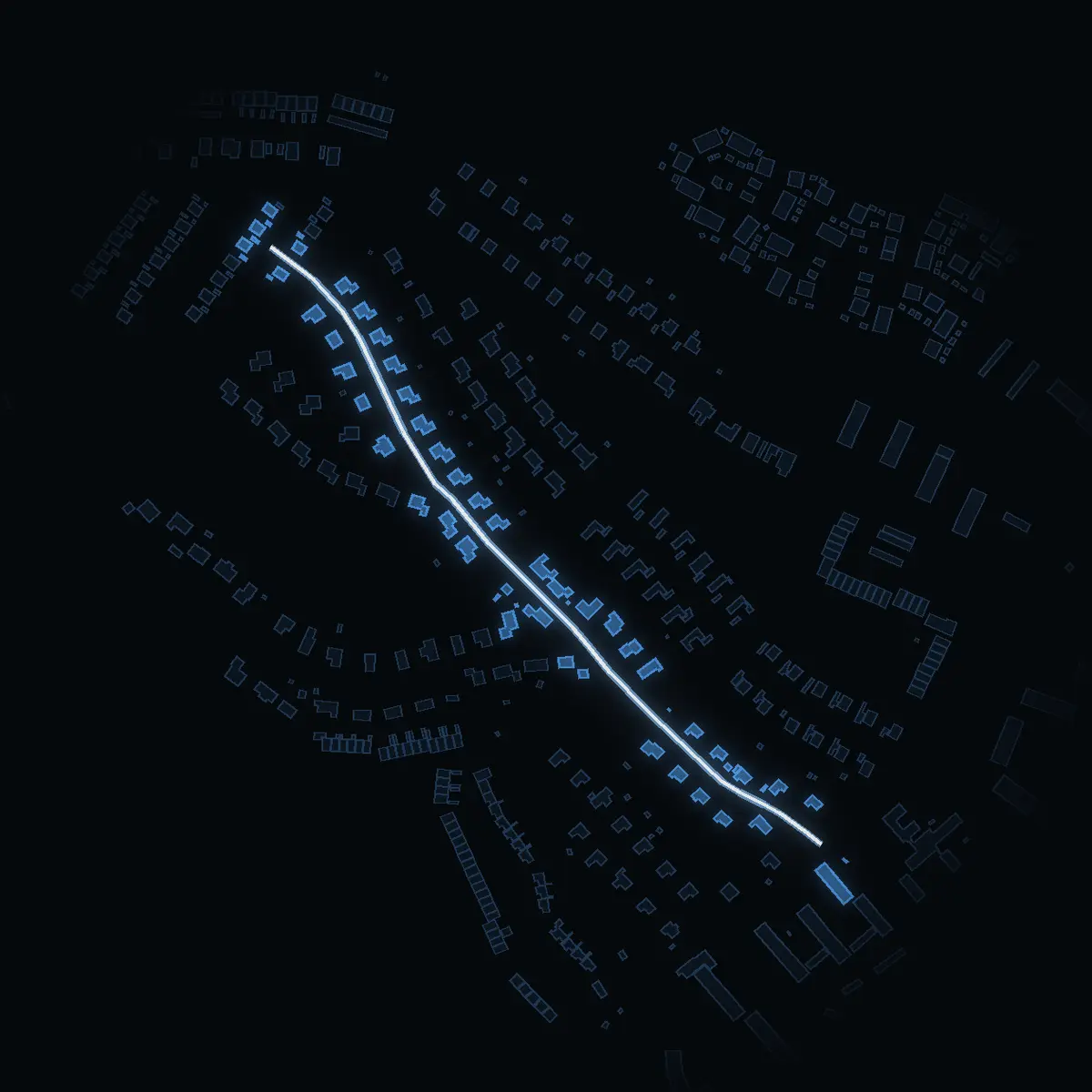 The street at night: Klostervägen drawn in white, its buildings lit in the colour of their area’s income