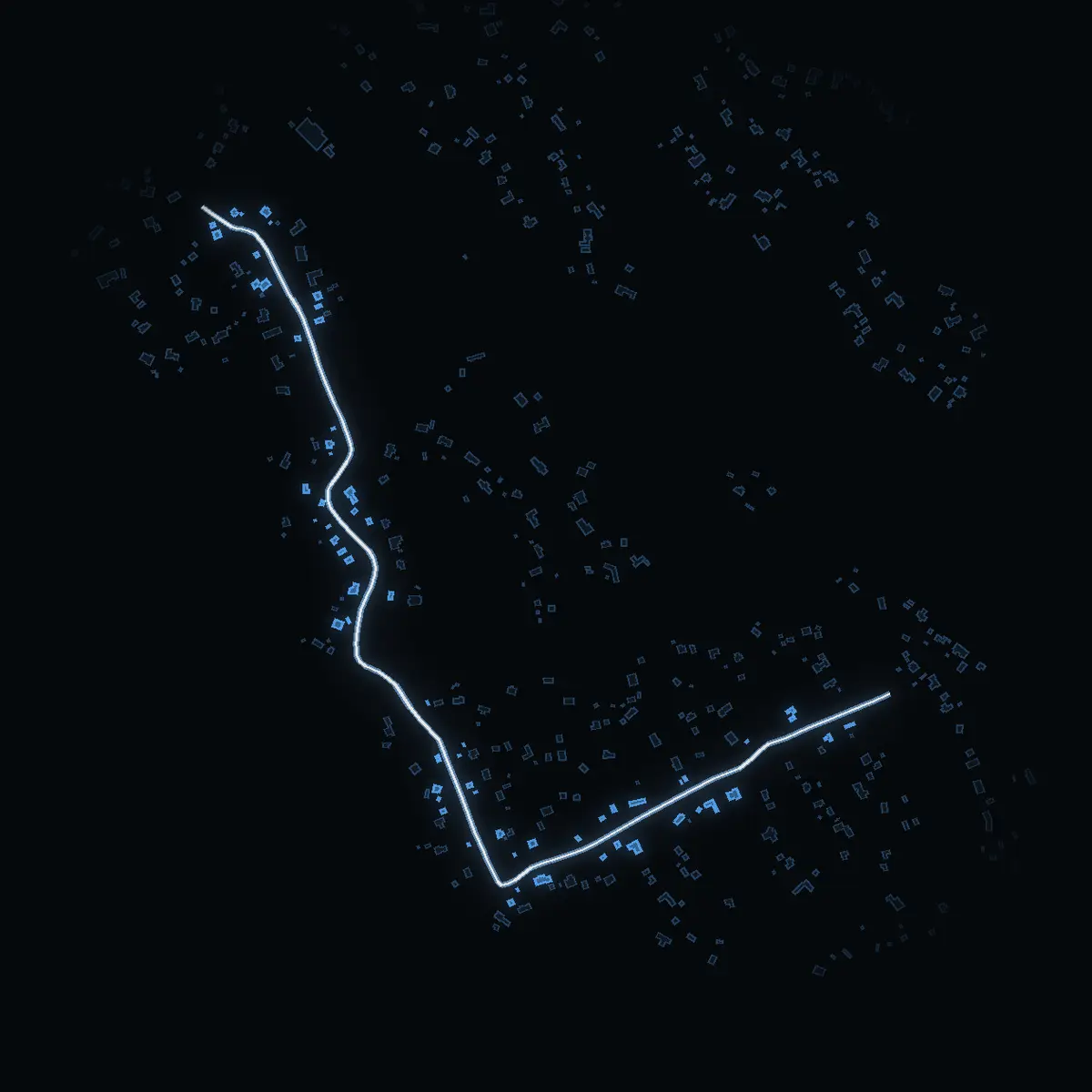 The street at night: Kolbacksvägen drawn in white, its buildings lit in the colour of their area’s income