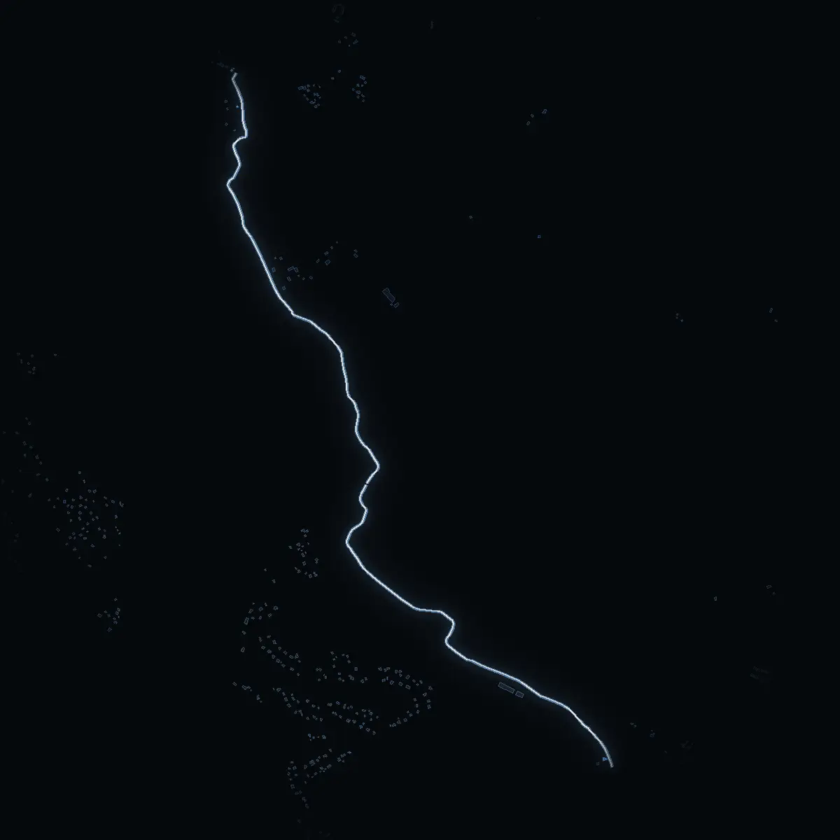 The street at night: Sandövägen drawn in white, its buildings lit in the colour of their area’s income