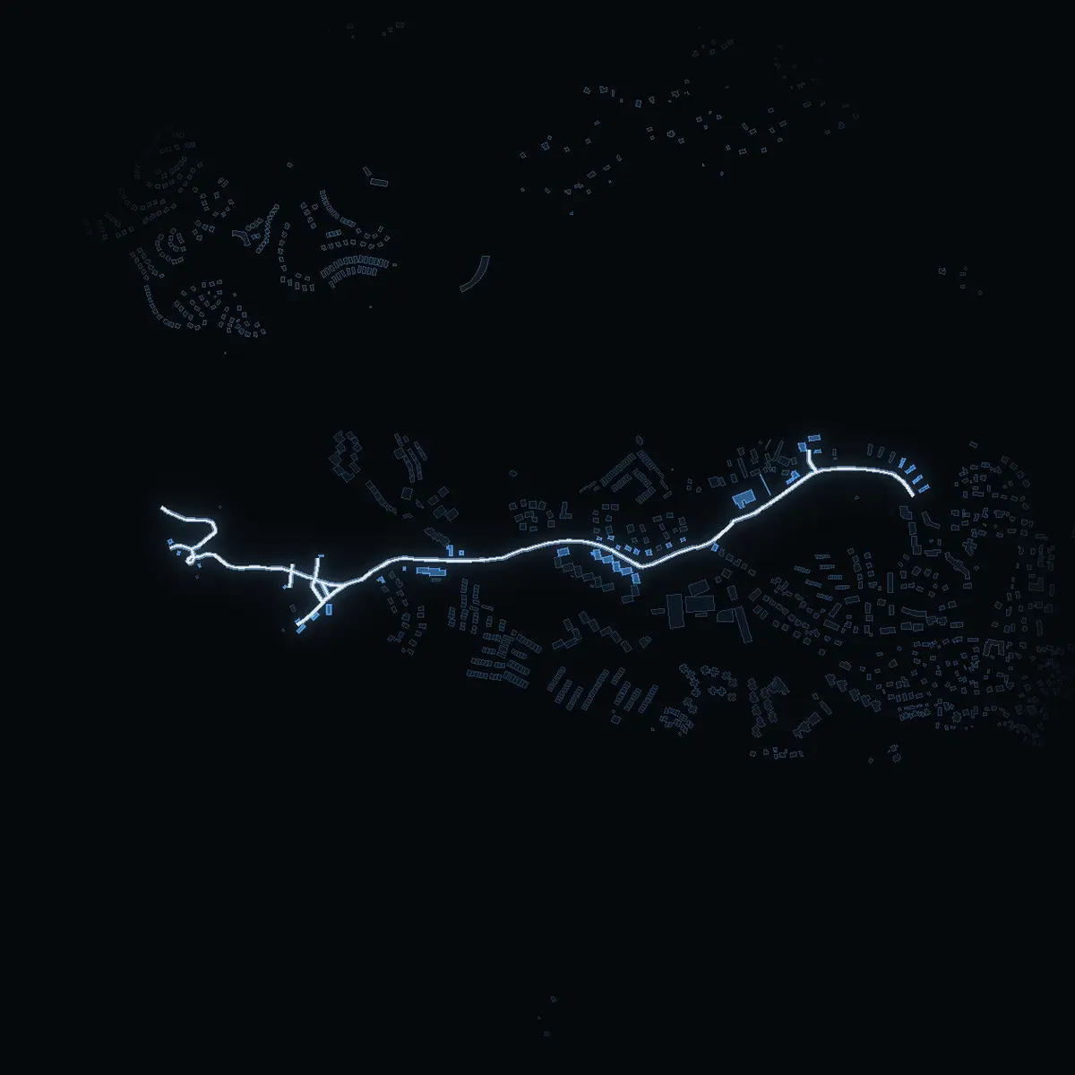 The street at night: Eriksövägen drawn in white, its buildings lit in the colour of their area’s income