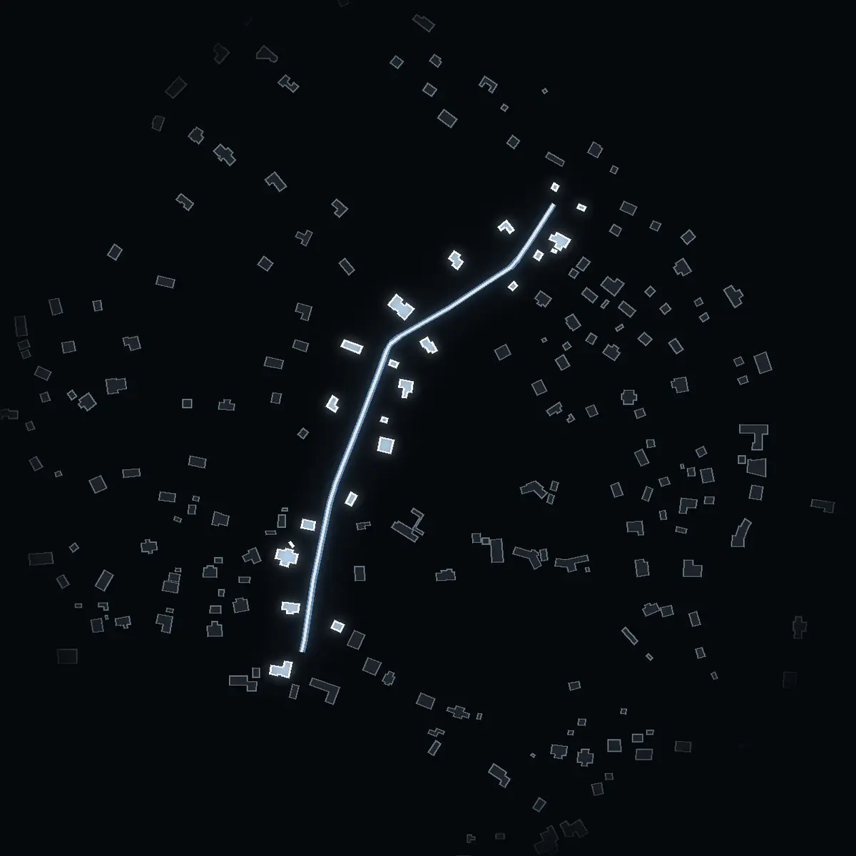 The street at night: Yttriumvägen drawn in white, its buildings lit in the colour of their area’s income